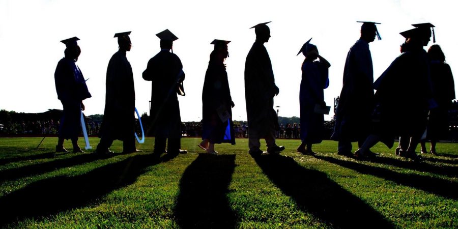 Graduates walking towards future