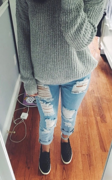 Junior, Lexi Magistro, shows off her stylish ripped jeans in a fashion-forward fall outfit